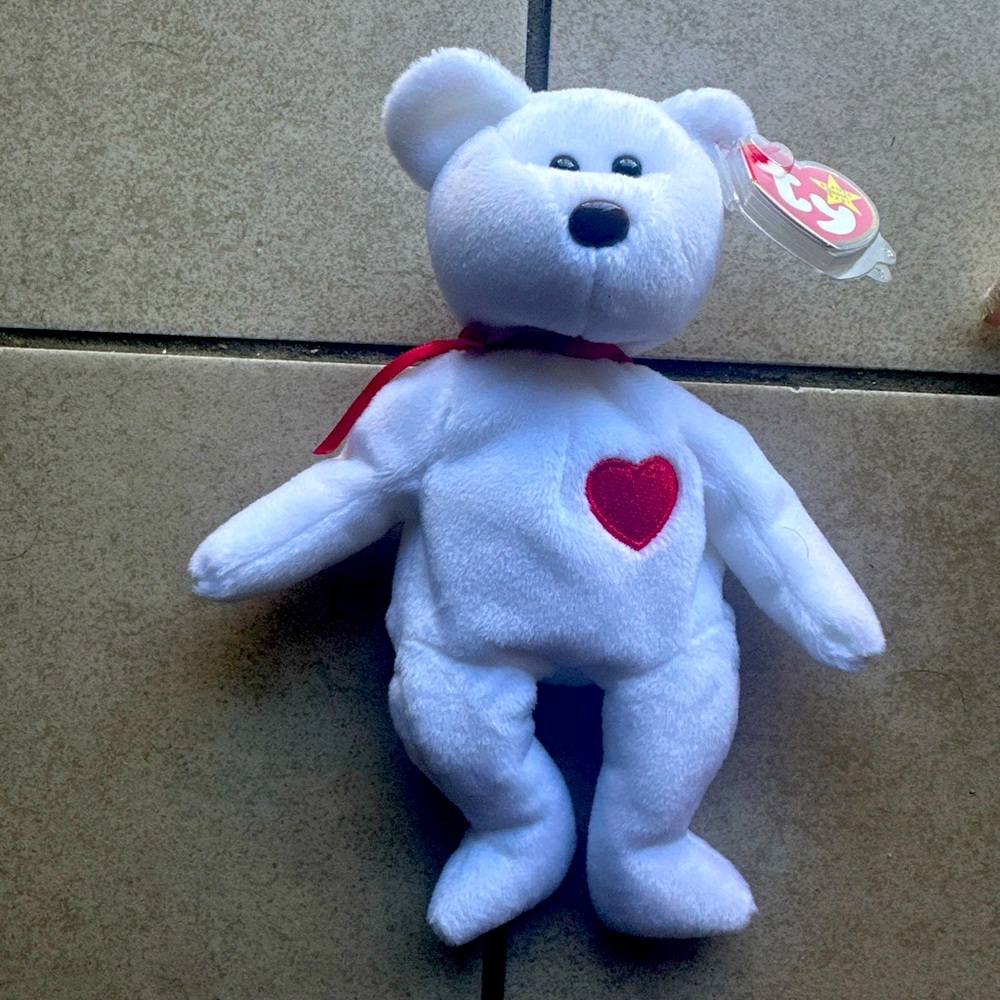 RARE VALENTINO BEANIE BABIE WITH TAG ERROR ON DATE  DESCP ON PICTURE